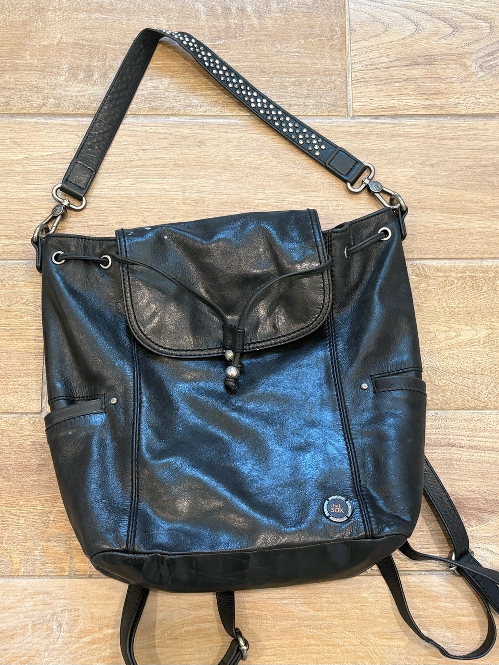 The Sak Black Leather Convertible Hobo Backpack